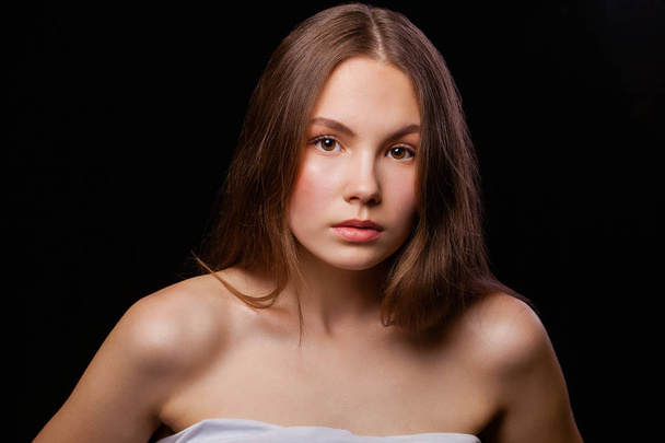 Close up Make up fashion model. Young beautiful brunette girl, on studio black wall background - Foto, imagen