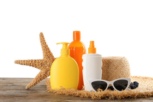 Composition with sun protection products on white background. Body care - Foto, Imagen