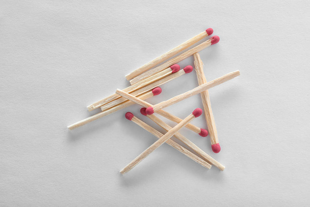 Pile of wooden matches on white background, top view - Φωτογραφία, εικόνα