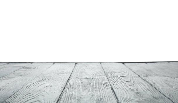 Empty wooden table surface on white background. Mockup for design - Fotó, kép