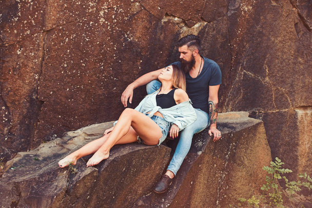 The best romantic vacation for couple. Couple in love on summer vacation. Sensual couple on vacation trip. Sexy woman and bearded man on natural landscape. Love makes everything possible - Foto, Bild