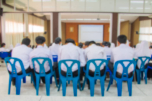 blur of student Muslims and teacher seminar in the lecture room which has projector screen white with copy space add text - Photo, Image