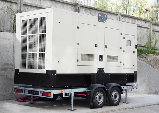Standby power natural gas backup generator with control panel.  Standby power generator outdoor. - Photo, Image