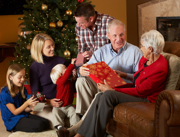 Multi Generation Family Opening Christmas Presents - Photo, Image
