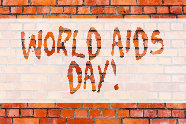 Kirjoitan lappua, jossa näkyy maailman aids-päivä. Business valokuva esittelee 1. joulukuuta omistettu tietoisuuden lisäämiseksi AIDS Brick Wall taidetta kuten Graffiti motivoiva puhelu kirjoitettu seinään
. - Valokuva, kuva
