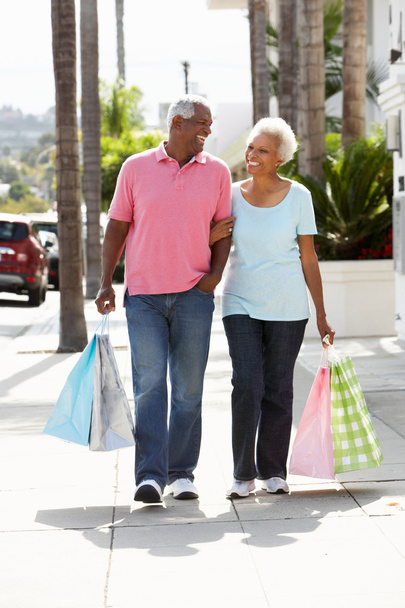 Senior Couple Carrying Shopping Bags - Photo, Image