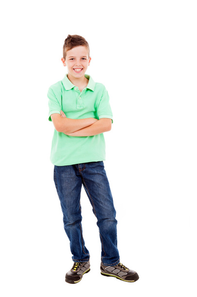 Full length portrait of a happy little boy standing with folded - Foto, afbeelding