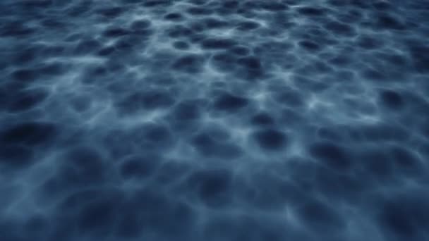 Dark blue ocean bottom surface. Abstract rays of sunlight shining through the water. Fractal waves underwater. - Footage, Video