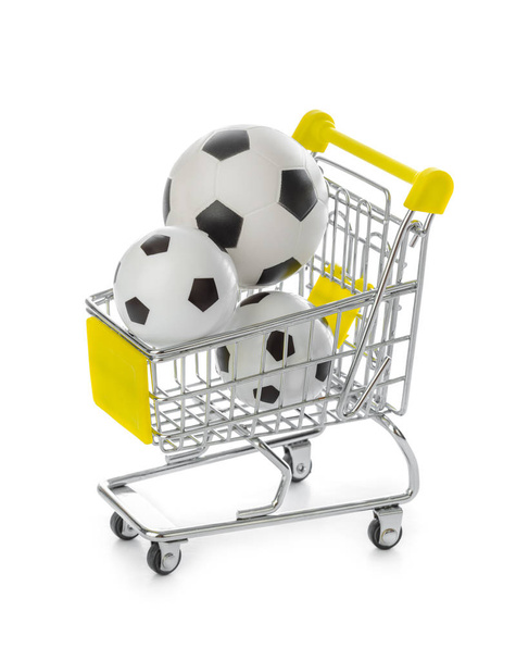 Soccer balls in shopping cart isolated on white background - Фото, изображение