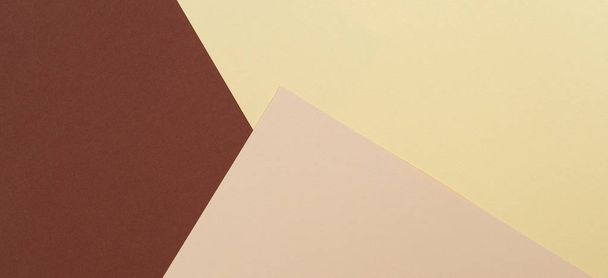 Χρώμα χαρτιού γεωμετρία φόντο σύνθεση με κίτρινο μπεζ και καφέ τόνους - Φωτογραφία, εικόνα