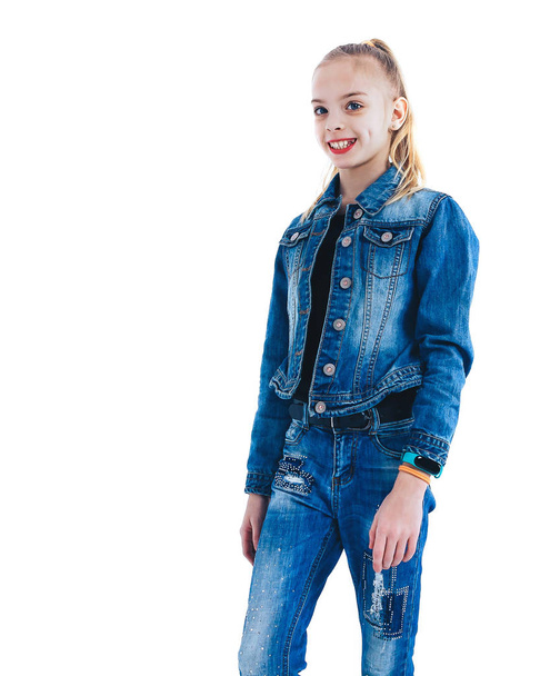Young beautiful girl in denim suit isolated on white - Foto, Imagen