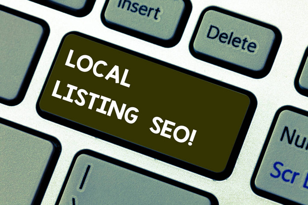 Conceptual hand writing showing Local Listing Seo. Business photo showcasing promotional strategy used improve visibility your business Keyboard key Intention to create computer message idea. - Photo, Image