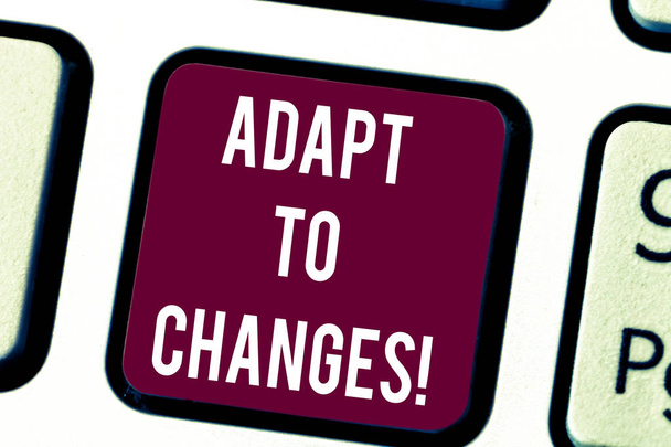 Conceptual hand writing showing Adapt To Changes. Business photo text change your ideas or behaviour to deal with it successfully Keyboard key Intention to create computer message idea. - Photo, Image
