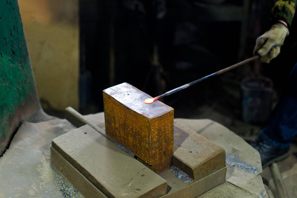 Blacksmith forges in hydraulic press - Photo, Image