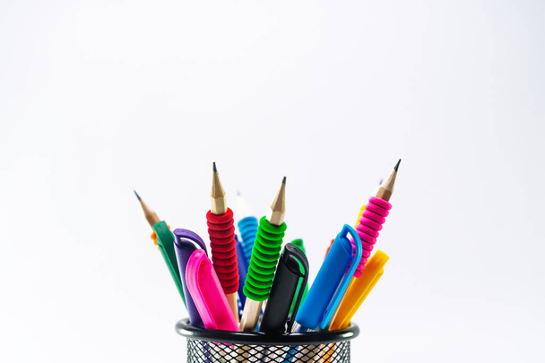 Colored pencils in a pencil case on white background - Fotoğraf, Görsel