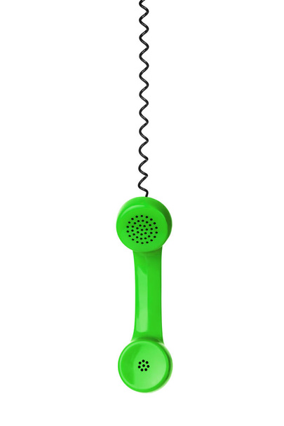 Zöld telefon és kábel elszigetelt fehér háttér - Fotó, kép
