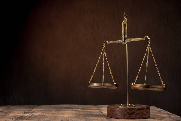 Law scales on table. Symbol of justice - Image - Fotografie, Obrázek