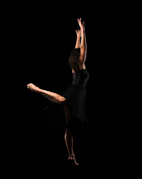 Girl ballet dancer on black background - Фото, изображение