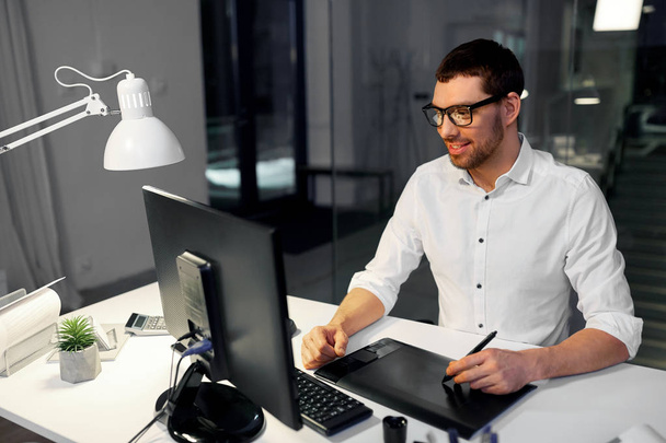 designer with computer and pen tablet at office - Φωτογραφία, εικόνα