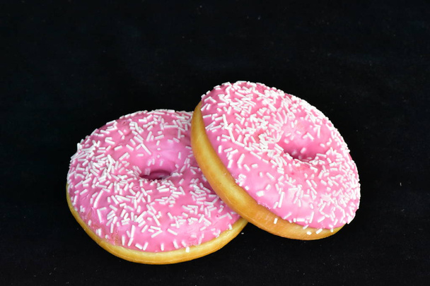 donitseja vaaleanpunainen lasite lähikuva
  - Valokuva, kuva