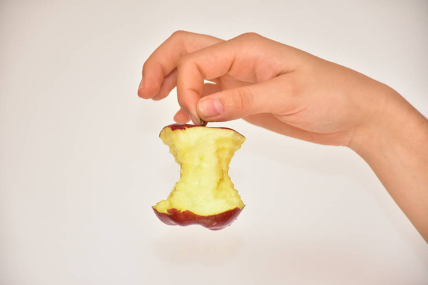 hand and apple close up  - Фото, изображение