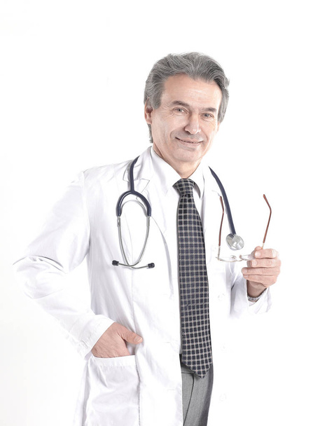 Portrait of mature medical doctor with white coat and stethoscope on isolated background - Фото, зображення
