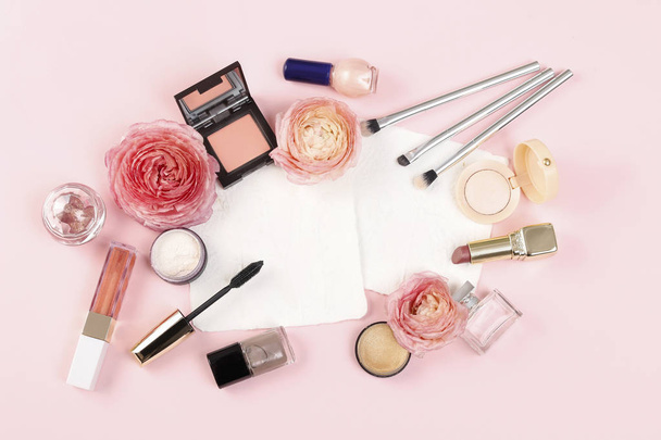 Cosmetics on pink background, copy space. - Фото, изображение