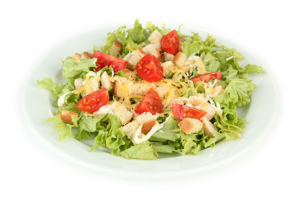 Caesar salad on white plate, isolated on white - Фото, зображення