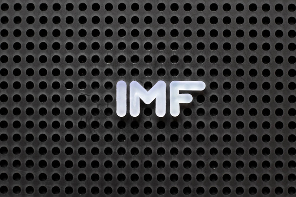Pegboard cor preta com letra branca em palavra FMI (abreviatura Fundo Monetário Internacional
) - Foto, Imagem