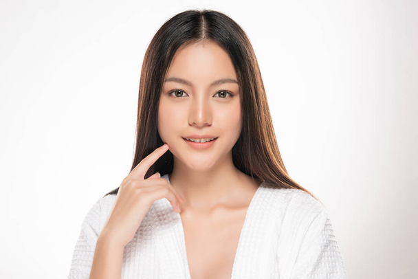 Beautiful Young asian Woman with Clean Fresh Skin look. Girl beauty face care. Facial treatment. Cosmetology, beauty and spa. - Photo, Image