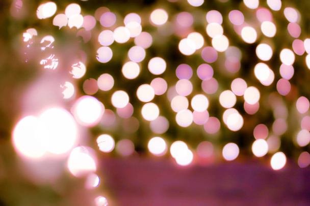 Blurred and bokeh pink led lighting of Valentine 's night party in full screen background
. - Фото, изображение