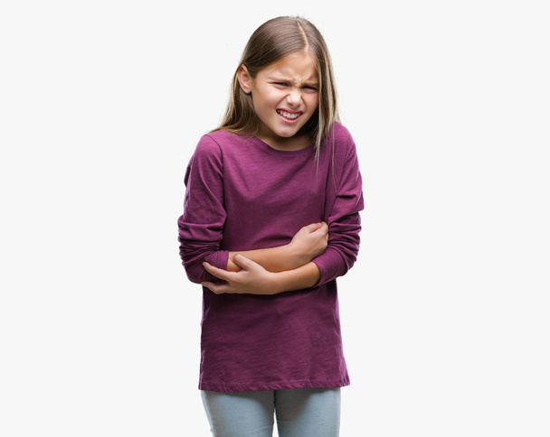 Mooi meisje over geïsoleerd achtergrond met hand op de maag omdat indigestie, pijnlijke ziekte onwel. Ache concept. - Foto, afbeelding