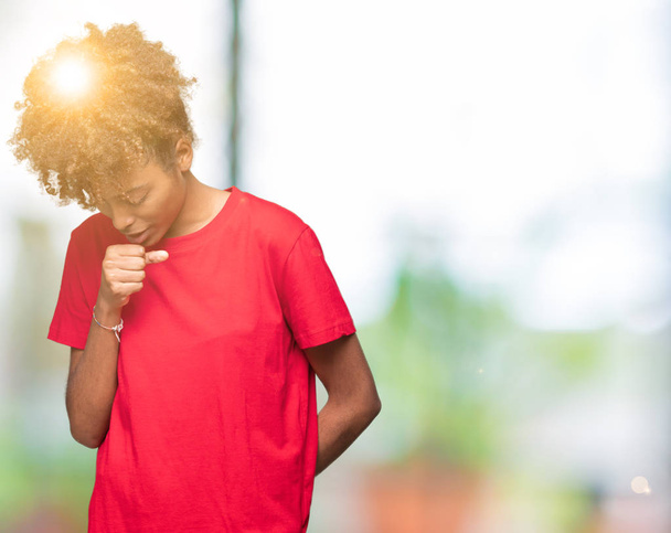 Beautiful young african american woman over isolated background feeling unwell and coughing as symptom for cold or bronchitis. Healthcare concept. - Photo, Image