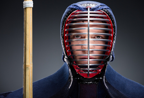 Portrait of kendo fighter with shinai - 写真・画像