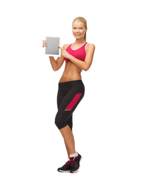Sporty woman with tablet pc - Zdjęcie, obraz
