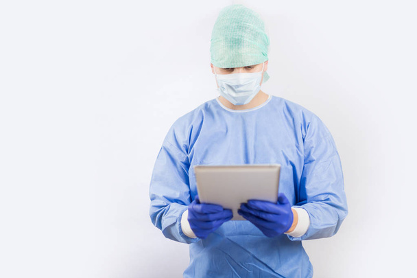 Working surgeon in a hospital operating room - Fotó, kép