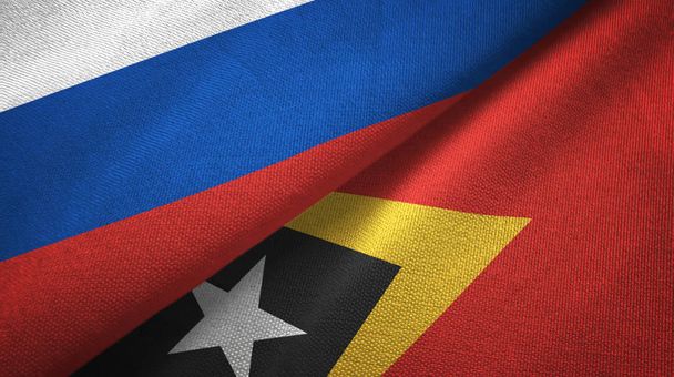Oroszország és Kelet-Timor Kelet-Timor két hajtogatott zászlók együtt - Fotó, kép