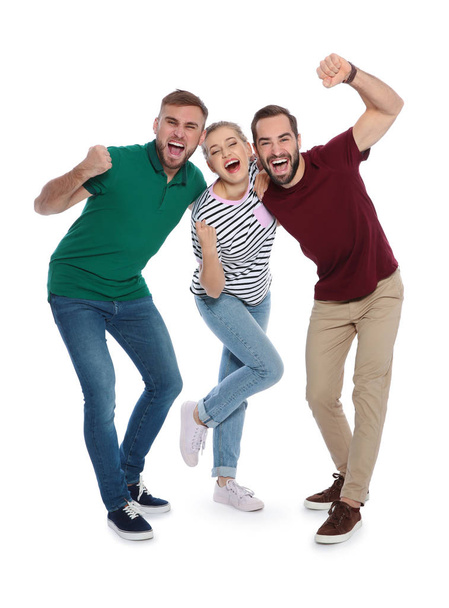 Young people celebrating victory on white background - Foto, Bild