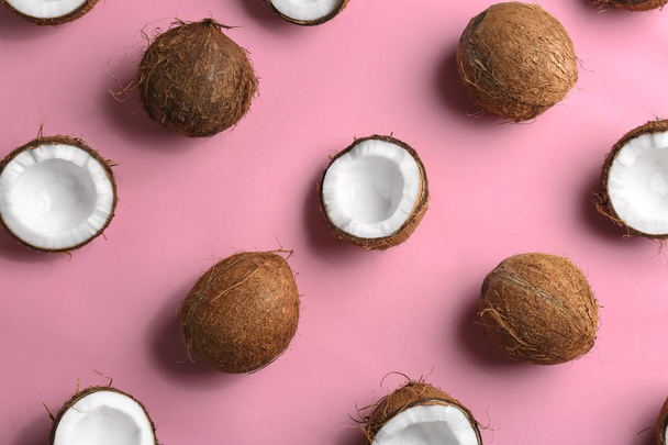 Coconut pattern on color background, flat lay - Foto, afbeelding