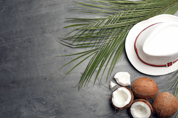 Flat lay composition with coconuts and space for text on grey background - Zdjęcie, obraz