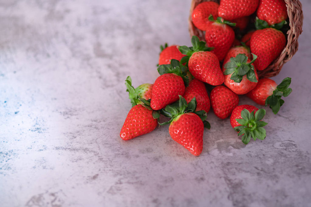 Strawberries on gray background. Place to text. - Foto, imagen