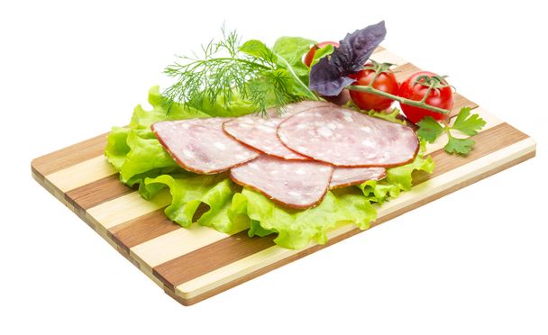 worst met salade en basilicum - Foto, afbeelding