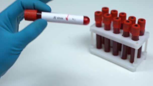 Negative JE virus test, doctor showing blood sample lab research health check-up - Filmati, video