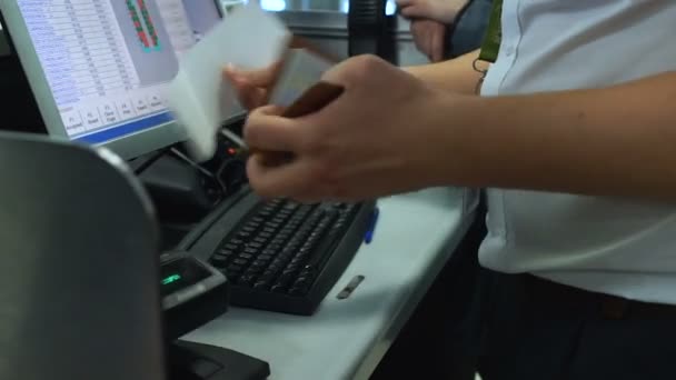 Passport control officer checking tickets and doc, visa-free regime, immigration - Filmati, video