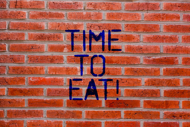 Text sign showing Time To Eat. Conceptual photo Right moment to enjoy a meal lunch dinner good food starving Brick Wall art like Graffiti motivational call written on the wall. - Photo, Image