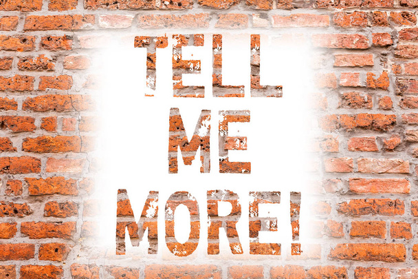 Text sign showing Tell Me More. Conceptual photo A call to start a conversation Sharing more knowledge Brick Wall art like Graffiti motivational call written on the wall. - Photo, Image