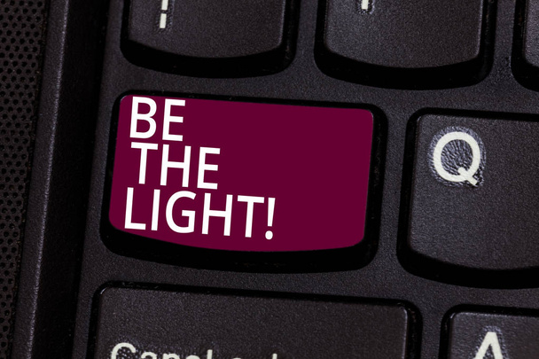 Word writing text Be The Light. Business concept for Enlighten other showing with your attitude be optimistic Keyboard key Intention to create computer message pressing keypad idea. - Photo, Image
