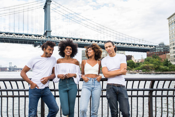 Group of afroamerican friends bonding in Manhattan, New York - Young adults having fun outdoors, concepts about lifestyle and young adult generation - Fotografie, Obrázek