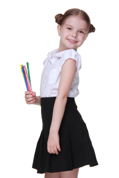 Studio portrait of schoolgirl with felt-tip pens - Foto, immagini