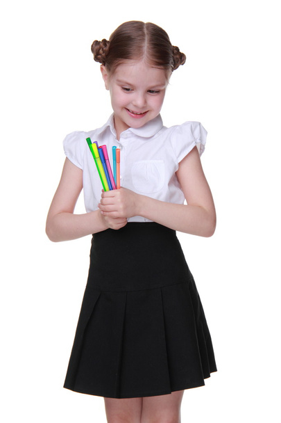 Studio portrait of schoolgirl with felt-tip pens - Zdjęcie, obraz